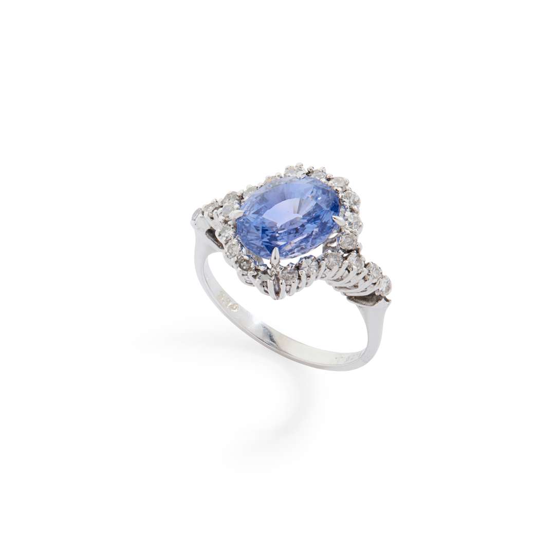 A Sri-Lankan sapphire and diamond cluster ring