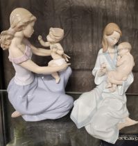 Two Lladro figure groups of Mother with Child and Mother with Baby, 25cm and 27cm. (2)