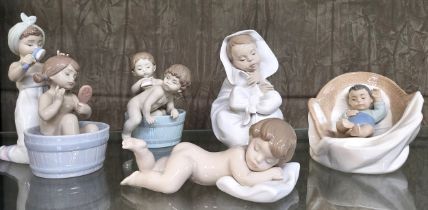 Three Lladro children groups and two Nao child figures, 11cm to 18cm. (5)