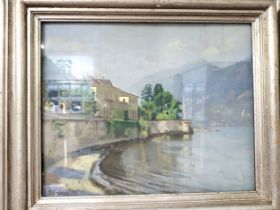 An oil on board featuring the Italian Lakes, possibly Lake Maggiore. signed E. Chiusa. Framed and