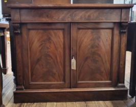 An early to mid Victorian mahogany chiffonier, with later associated top with scroll carved