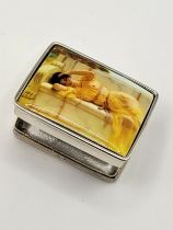 A sterling silver pill box, the lid with an enamel panel depicting the Neoclassical painting of '
