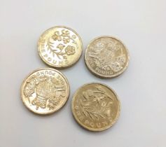 Four old £1 coins