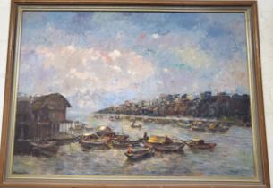 An Asian river scene, oil on canvas, framed. 64cm x 88cm