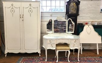 A classical bedroom set including a wardrobe (190cm x 122cm x 55cm), a kidney-shaped dressing