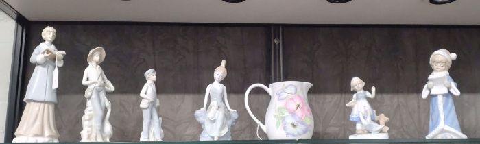 Six Chinese and Japanese figures (in the Lladro style) 15cm to 25cm and a porcelain jug 13.5cm (7)