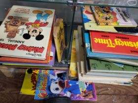Mickey Mouse Annuals and story books.