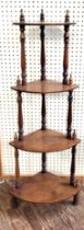 A 20th century mahogany four tier what-not, with turned spindle posts. 120cm x 48cm.