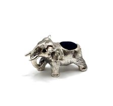 A novelty silver pincushion in the form of an elephant, 2.2 cm high.