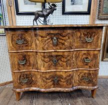 A figured walnut chest of drawers. 88cm x 120cm x 68cm.