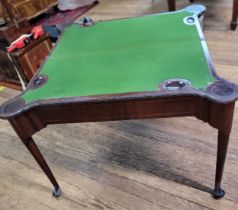 A mahogany folding card table, supported on tapered legs, with green baize lining. 75cm x 106cm x 52