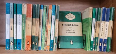 Twenty-three vintage Penguin books, including titles by Charlotte Bronte, Agatha Christie, PG