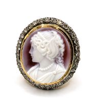 An 18ct yellow gold, diamond, and cameo cocktail ring, the cameo depicting a young woman in profile,