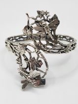 A silver cuff bangle, decorated with butterflies and ivy leaves, marked 925.