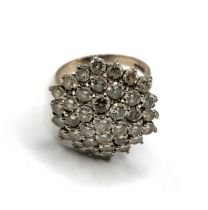 An 18ct white gold and diamond hexagonal cluster ring, set with thirty seven round brilliant-cut