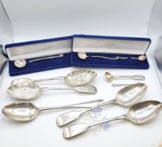 A pair Regency silver serving spoons, hallmarked London 1814, bearing makers marks for Josiah and