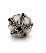 A 14ct white gold, opal, and sapphire ring, of dombed bombe design, inset with pear-cut opals and
