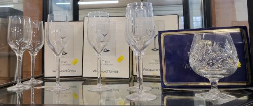 A Thomas Webb Brandy glass in box and three pairs of Wedgwood Crystal Theo claret glasses in boxes.