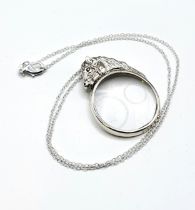 A novelty silver mounted magnifying glass pendant, the round glass surmounted with a horse's head,