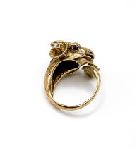 An unusual Greek yellow gold and diamond ring in the form of a ram's head, set with ruby eyes and