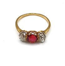 A late 19th/ early 20th century French diamond and orange spinel ring, set with a mixed-cut