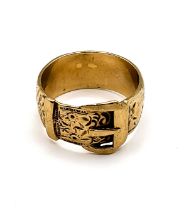 A 9ct yellow gold buckle ring, with engraved decoration around shank, hallmarked to interior, size