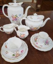 A Royal Crown Derby 'Derby Posies' tea and coffee set, a porcelain stand 18cm diameter, and six