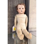 An Armand Marseille bisque head doll 370 with sleeping blue eyes, open mouth with four teeth and