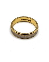 An 18ct yellow and white gold gentleman's wedding band, inscribed to interior 'Always', size R 1/2