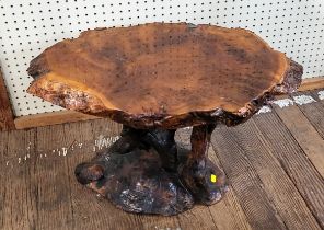 A carved walnut side table. 44cm x 72cm x 43cm.