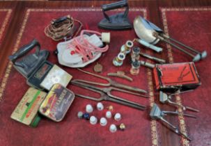 Opera glasses, irons, tins whistle