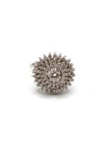 An 18ct white gold diamond circular cluster ring, hallmarked 18ct. Size N 1/2.