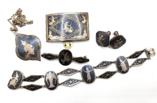 A group of Thai silver and niello jewellery, including a bracelet, a pendant on silver chain, a pair