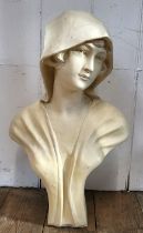 A bust of a young woman, stamped Monique NL 19920 (some damage to reverse).