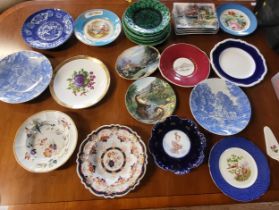 A group of dinner plates including examples by Wedgwood, Allerton, and a Royal Winton plate with