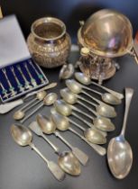 A small group of silver and plated items, to include a set of silver spoons, a plated muffin dish, a