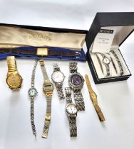 A collection of nine watches including a gentleman's Emporio Armani dress watch with a vintage