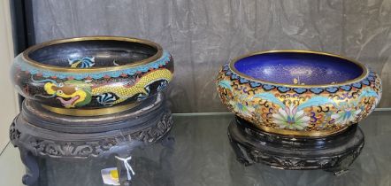 A Cloisonne bowl with dragon design 20cm diameter and a blossom and sparrow design 21cm diameter,