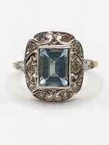 A yellow metal, diamond, and aquamarine ring, (unmarked, tests as 15ct gold), set with a rectangular