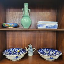 A pair of Oriental blue and white Prunus blossom bowls, 25cm (some damage), a Provincial blue and