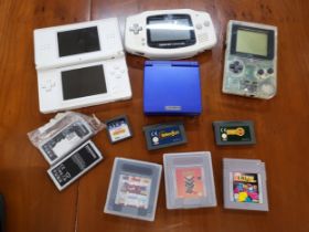 Four Nintendo 'Game Boy' consols and various games