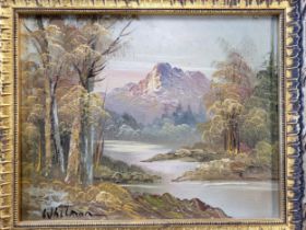 A rural mountainous lakeside scene, oil on canvas, signed Whitman lower left, and framed. 26cm x
