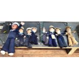 A Sailor boy doll with composition head 31cm and seven soft toy sailor boys 19cm to 23cm. (8)