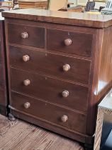 A mahogany two over three drawer chest of drawers