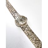 A ladies 'Tissot' stylist manual wind 1970's cocktail watch on an articulated frosted bracelet, dial