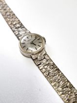 A ladies 'Tissot' stylist manual wind 1970's cocktail watch on an articulated frosted bracelet, dial