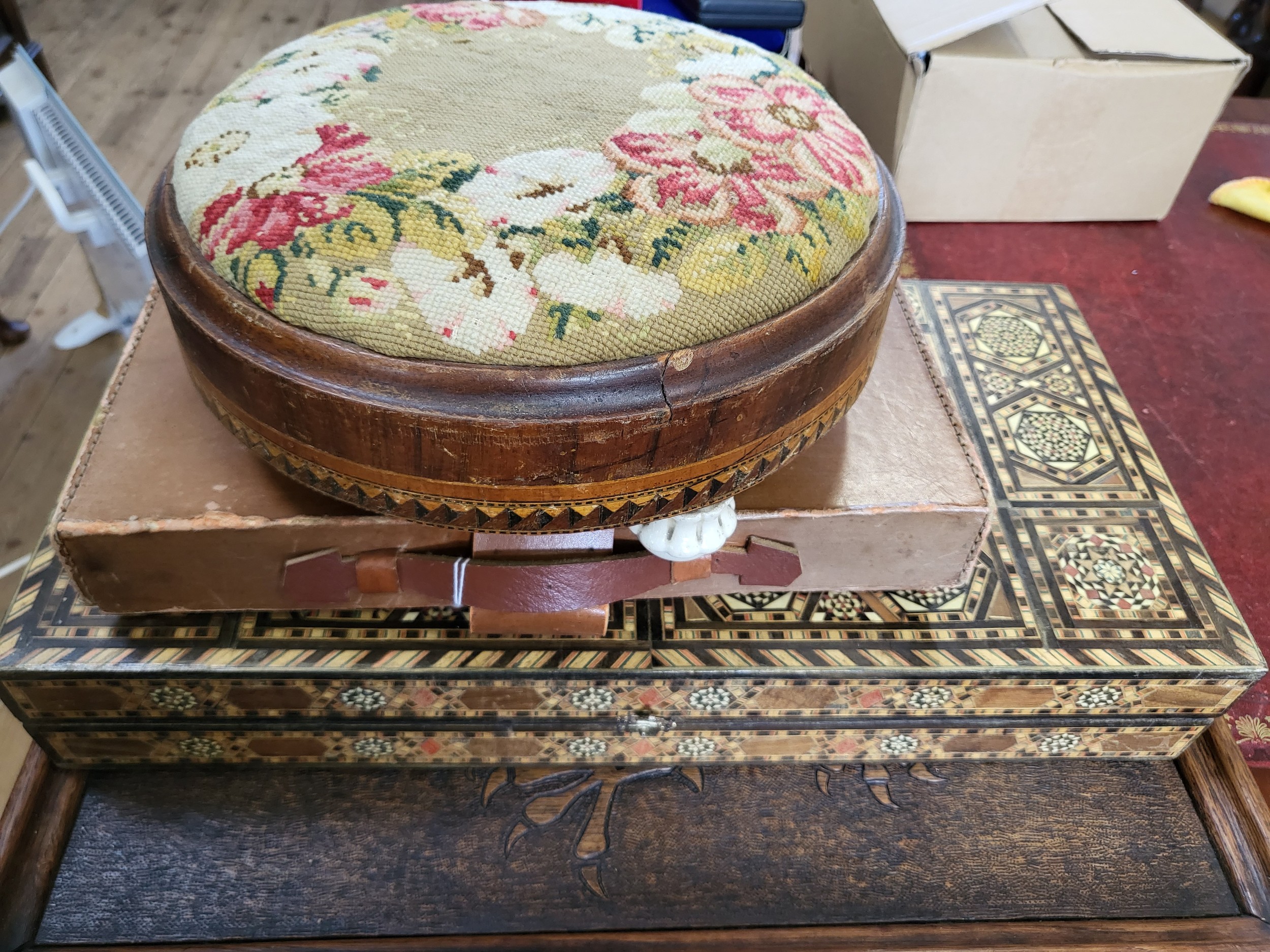 An antique/vintage 'Mah-Jongg' game in a leather bound case produced by Chad Valley, a backgammon