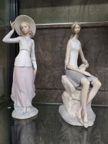 Two Lladro bisque figures of young ladies, 31cm (2)