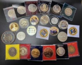 A collection of various commemorative coins, including a quantity of Silver Jubilee examples, a