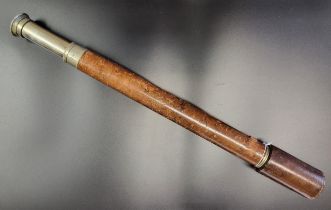 A brass and leather telescope by T. Cooke & Sons Ltd, London and York, no. 7641, with silvered